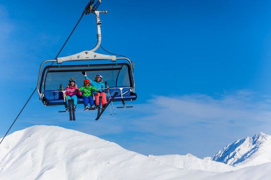 Skiers On Ski Lift