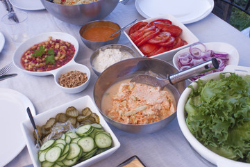 Party table full of salads