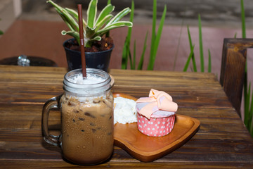 Iced coffee with blueberry cheese cake
