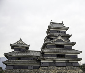 Fototapeta premium Masumoto Castle , Black in Japan with clear white sky sky
