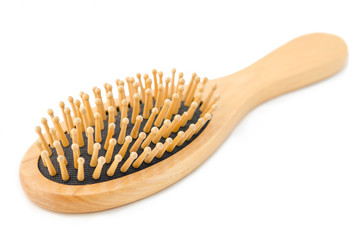Wooden hair brush.