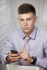 young man at the phone