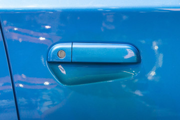 Blue car door lock and handle