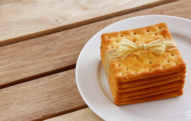 Many Yummy Square Cream Crackers For the best healthy foods and quick easy food composition are on the Earth tone scene. Dessert Concept.