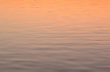 The reflection from the surface at sunrise.