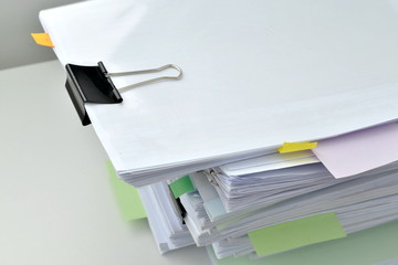 Documents/stack of documents on desk