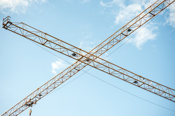 Crane in construction with blue sky