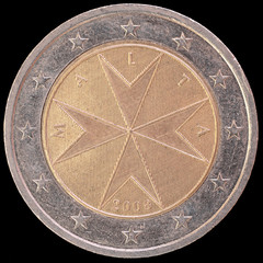 National side of Malta two euro coin on black background