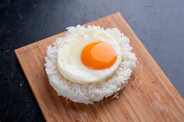 fried egg with steam rice