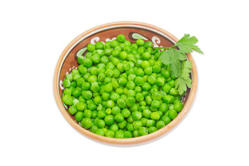 Green peas in ceramic bowl