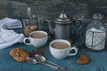 Coffee with milk and homemade oatmeal cookies
