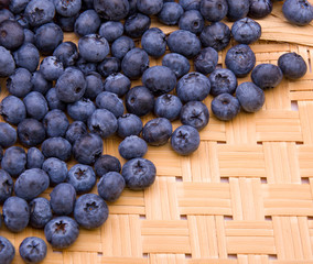Blueberries on wooden texture background
