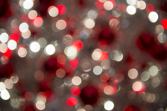 Colorful holiday Christmas lights background in abstract bokeh bubbles 