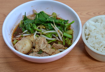 boiled slice pork in brown soup eat with rice