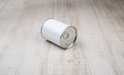 tin can on white wood background