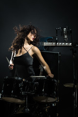 Woman playing drums