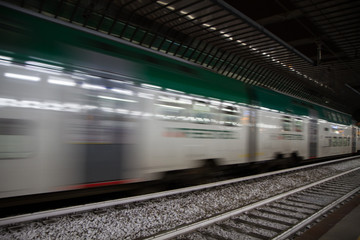 Naklejka premium Fast Passenger Commuter Train with Motion Blur