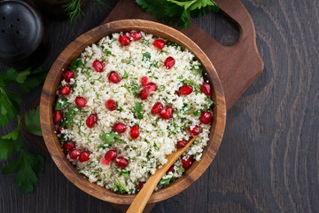Cauliflower couscous with herbs and pomegranate, top view