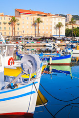 Small colorful wooden fishing boats in Ajaccio