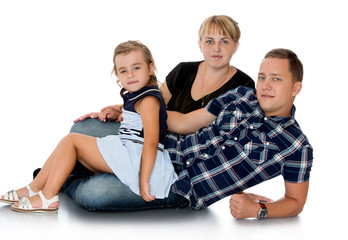 Mom dad and little daughter