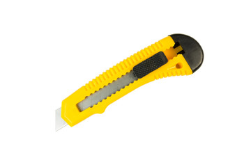 Stationery knife yellow and black. Isolated on a white background. Tools series.