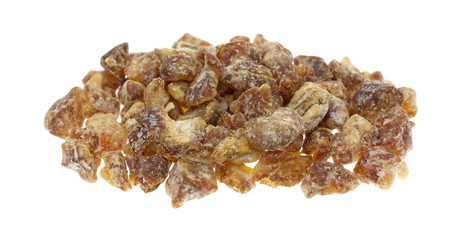 Pitted chopped dates on a white background