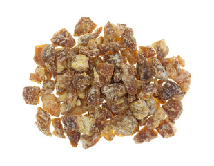 Pitted chopped dates on a white background top view