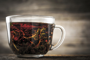 Tea with thyme in the glass cup