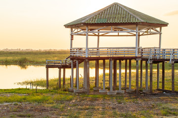 Dry or arid lake with old vintage pavilion.