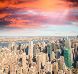Fototapeta premium Manhattan skyline at dusk. Aerial view