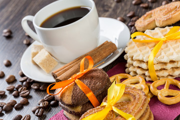 Fototapeta na wymiar Biscuits and coffee on table