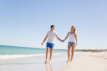 Romantic young couple on the beach