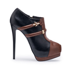 One of women's shoes black and brown stilettos with a decorative belt