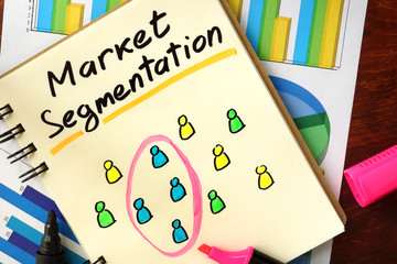 Notepad with market segmentation. Selected segment of customers concept.
