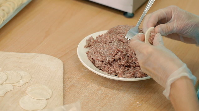 Making of dumplings, a national Russian dish