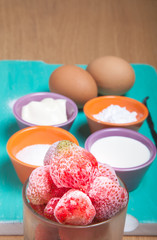 Ingredients for sweet pastry on a blue wooden cutting board. Sel