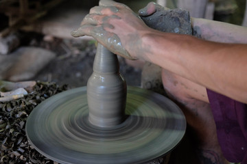 hand making pottery