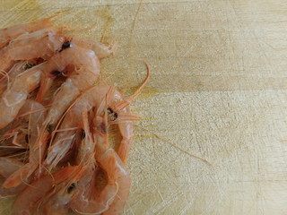 shrimp on wooden base