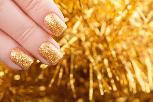 Beautiful golden manicure.