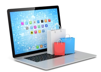 laptop and  shopping pags on white background