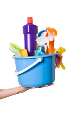 woman with cleaning equipment ready to clean house