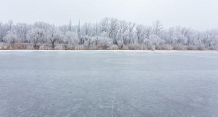 Winter time in forest lake. 