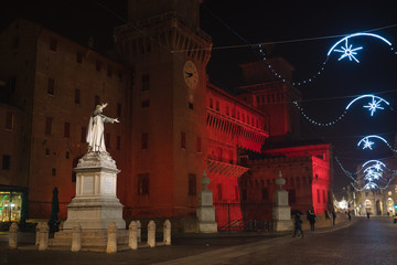 View of the castle of Ferrara at night with Christmas lights - Ferrara, Italy