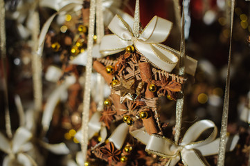 Christmas tree decor made of wicker, spices and decorations