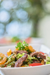 Warm salad with veal