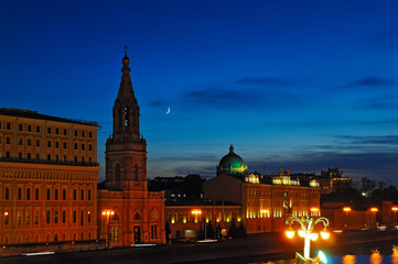 Night view of buildings and the bell tower in Moscow