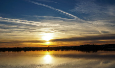 Fototapeta na wymiar sunset on a river