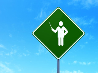 Studying concept: Teacher on road sign background