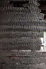Burnt broken wood wall