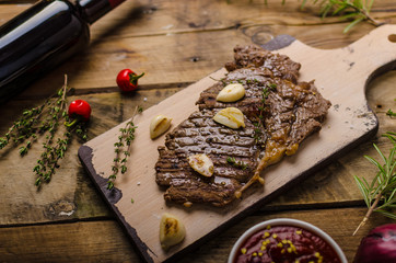 Rib eye steak with wine